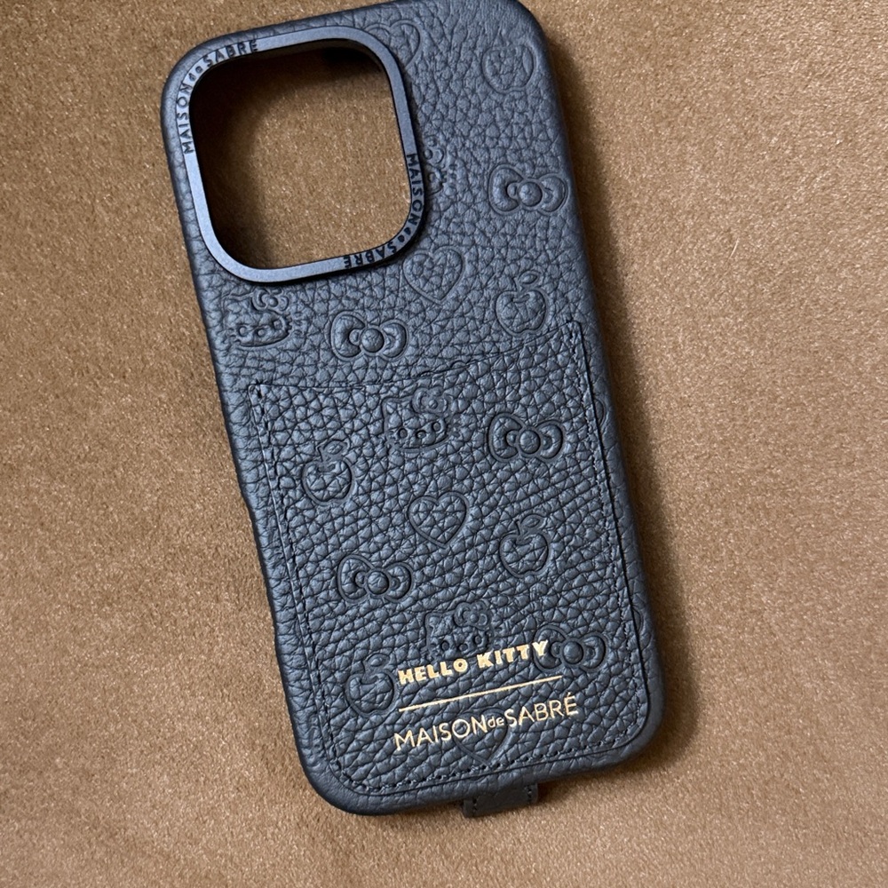 Maison de Sabre Hello Kitty sling IPhone 16 pro case